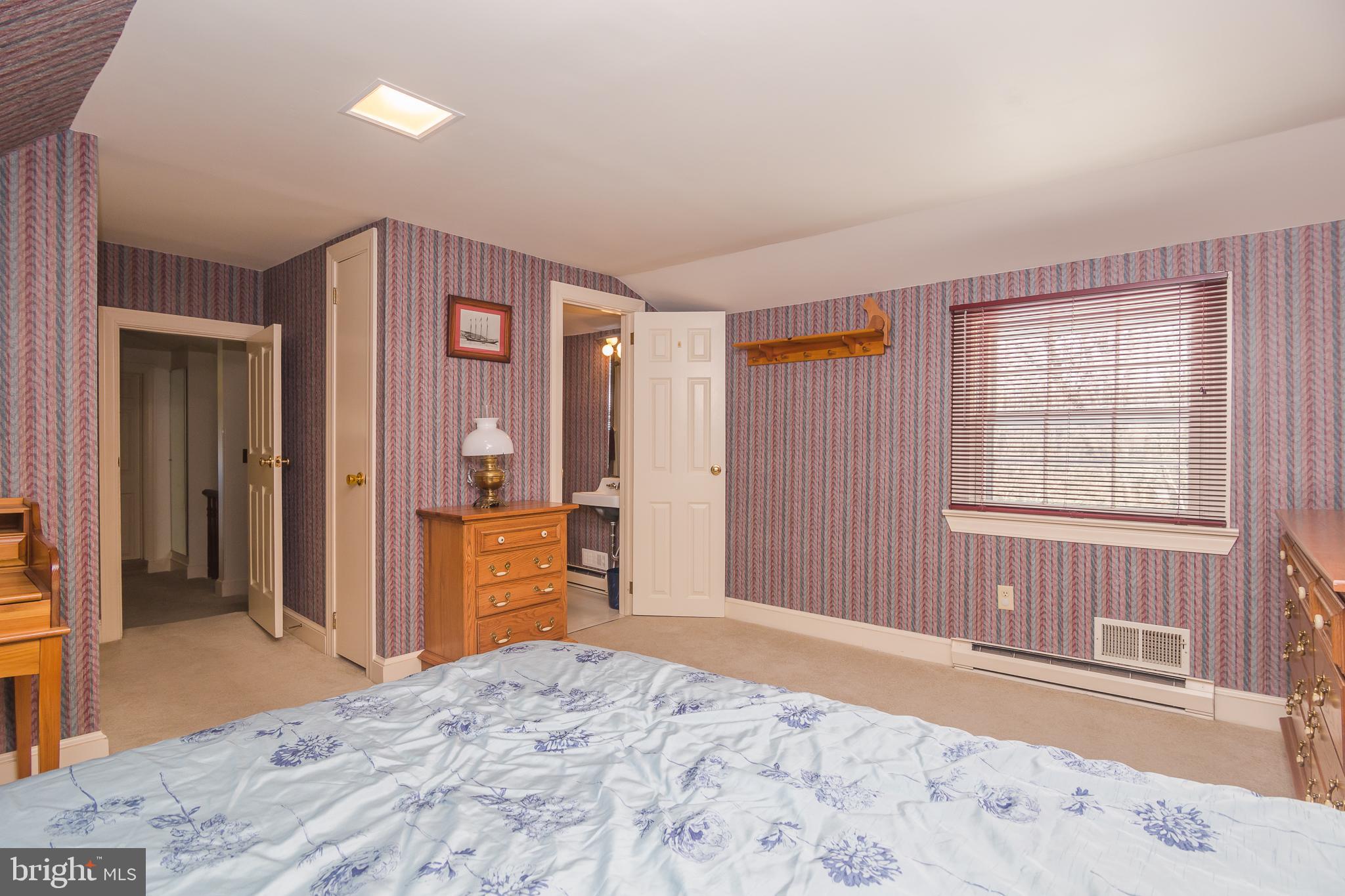 3387 Allen Road Eden, MD 21822 - Photo 34 of 67 a bedroom with a bed and wooden floor