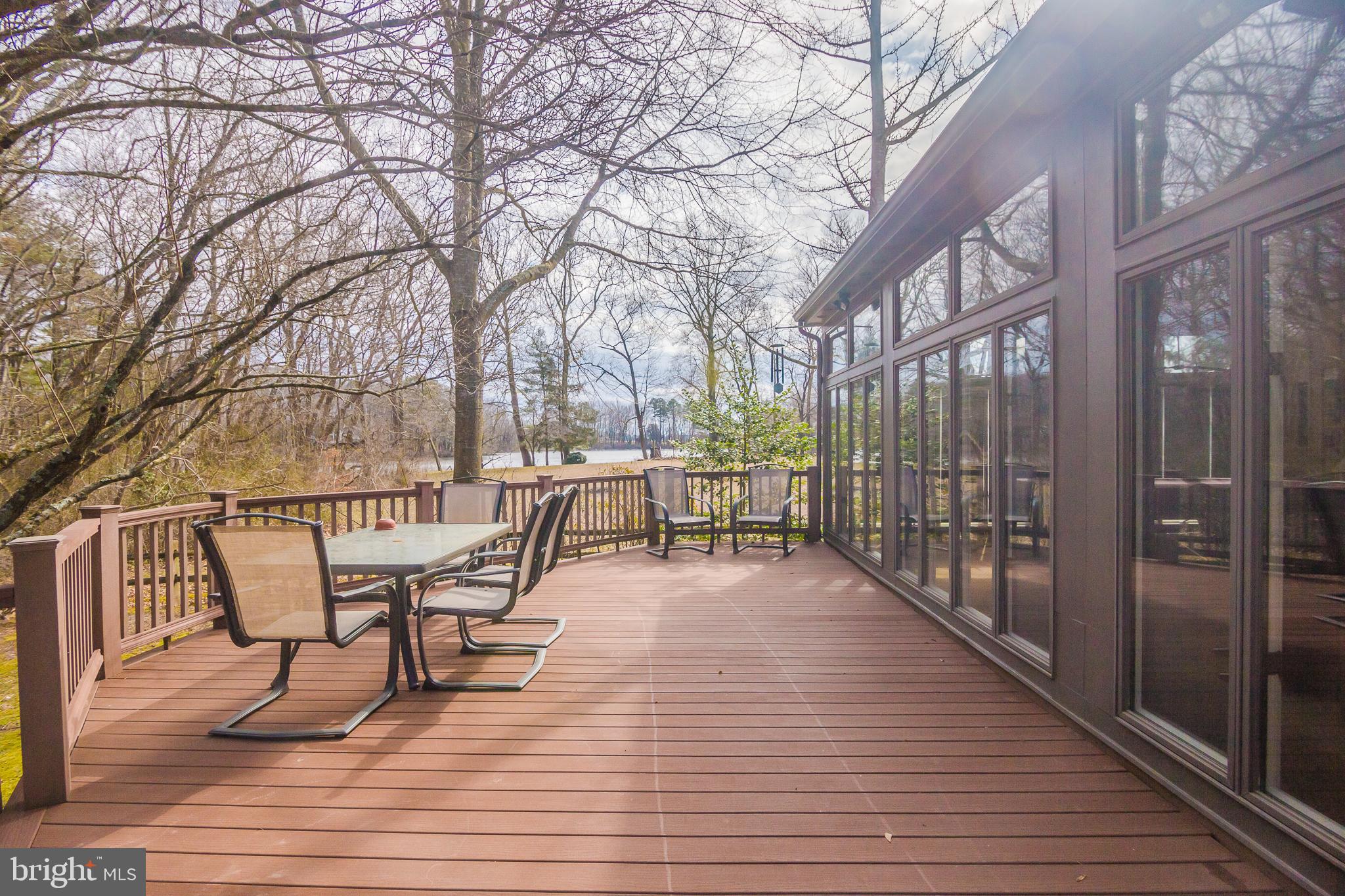 3387 Allen Road Eden, MD 21822 - Photo 45 of 67 a view of a chairs on deck with wooden floor and fence