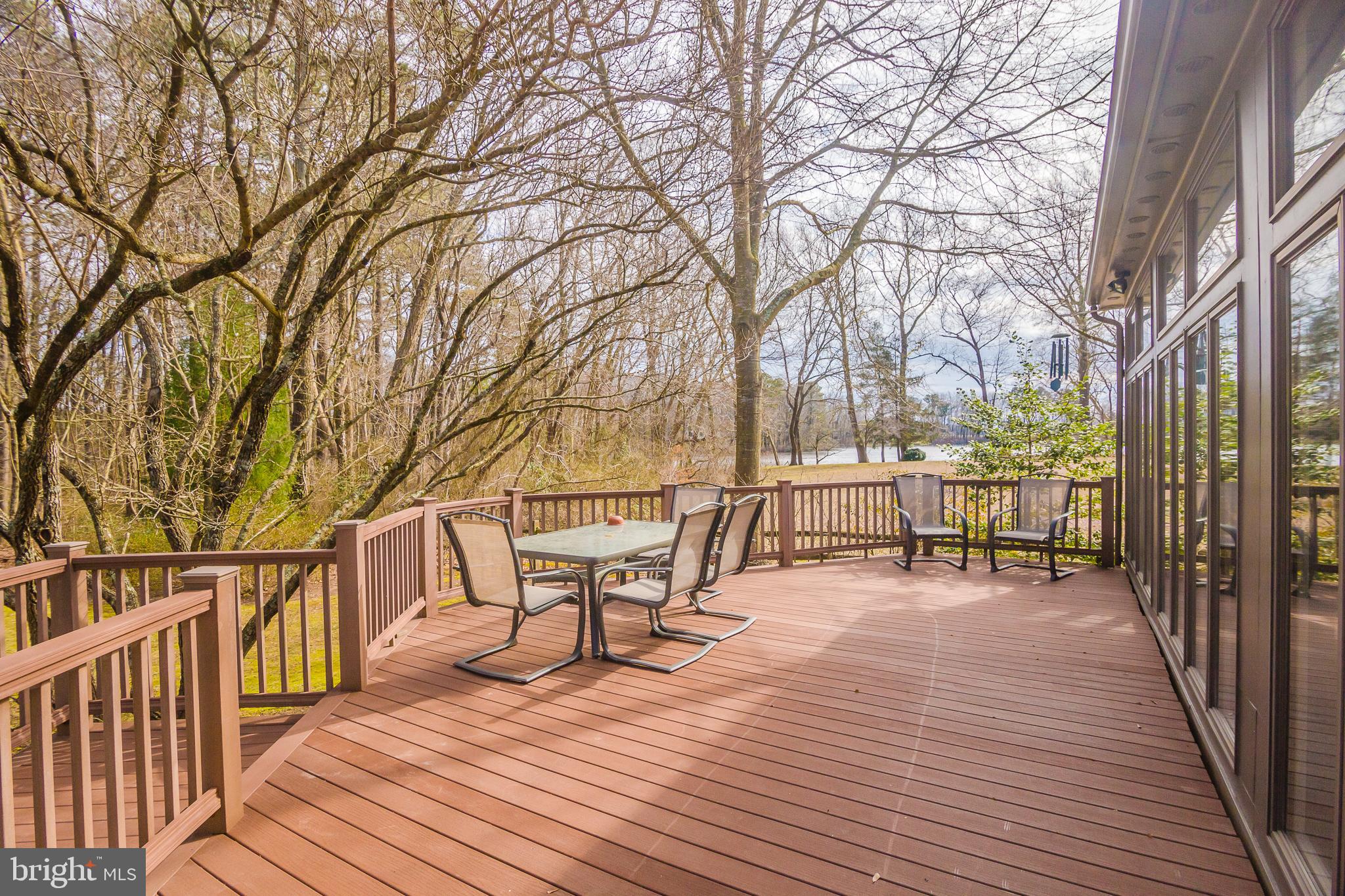 3387 Allen Road Eden, MD 21822 - Photo 46 of 67 a view of a chairs on deck with wooden floor and fence