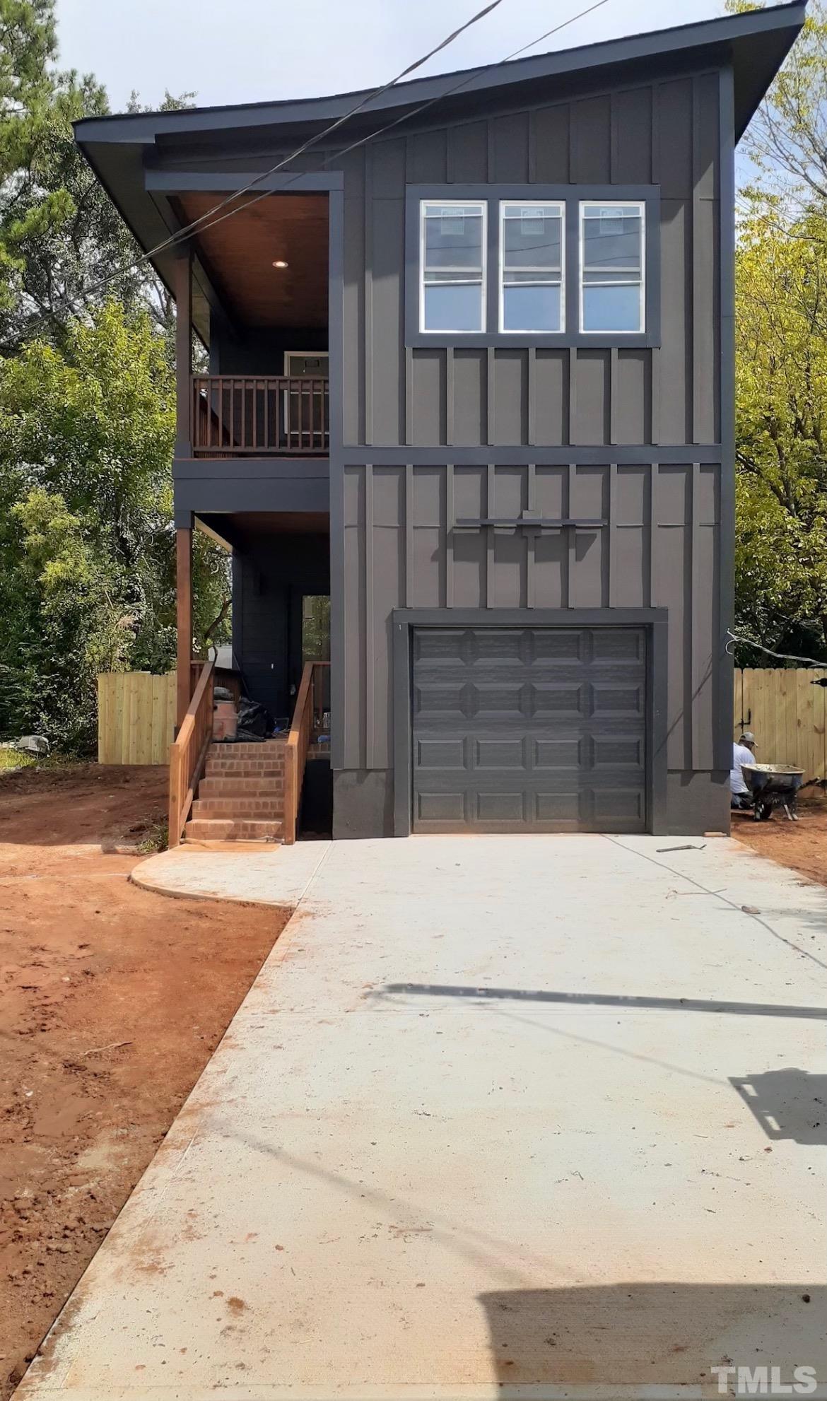 2311 Poole Road Raleigh, NC 27610 - Photo 1 of 29 a front view of a house with a garage
