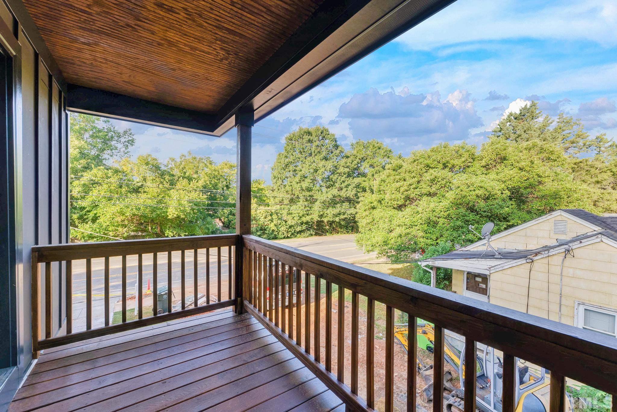2311 Poole Road Raleigh, NC 27610 - Photo 20 of 29 a view of a balcony with wooden floor
