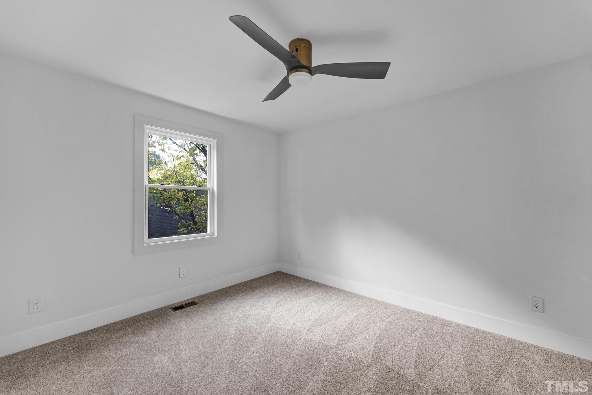 2311 Poole Road Raleigh, NC 27610 - Photo 23 of 29 an empty room with a window