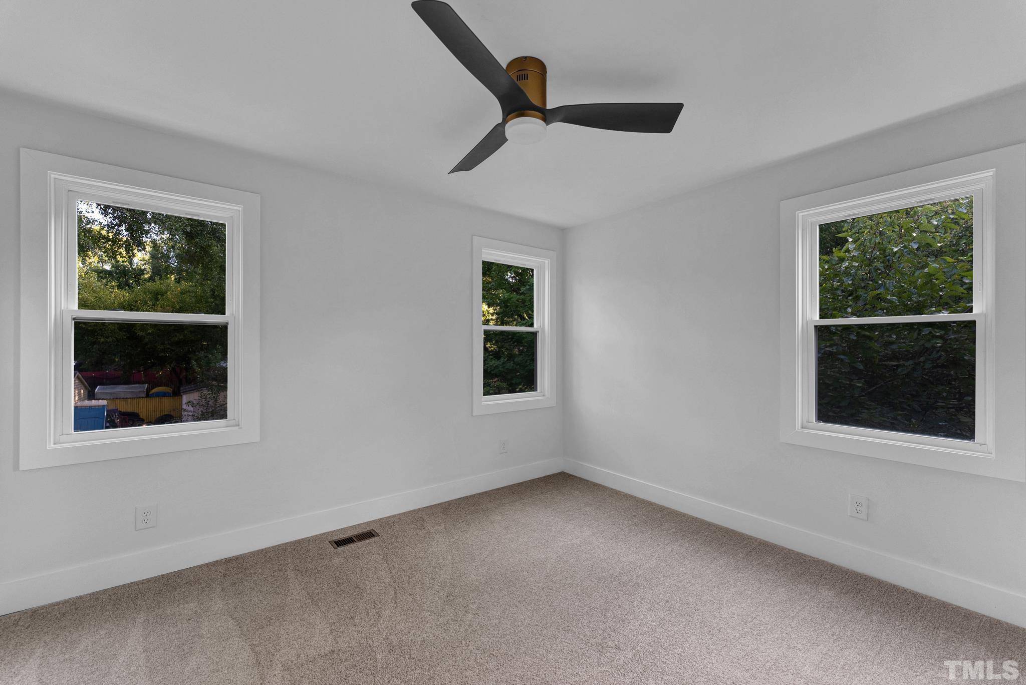 2311 Poole Road Raleigh, NC 27610 - Photo 24 of 29 a view of an empty room with a window