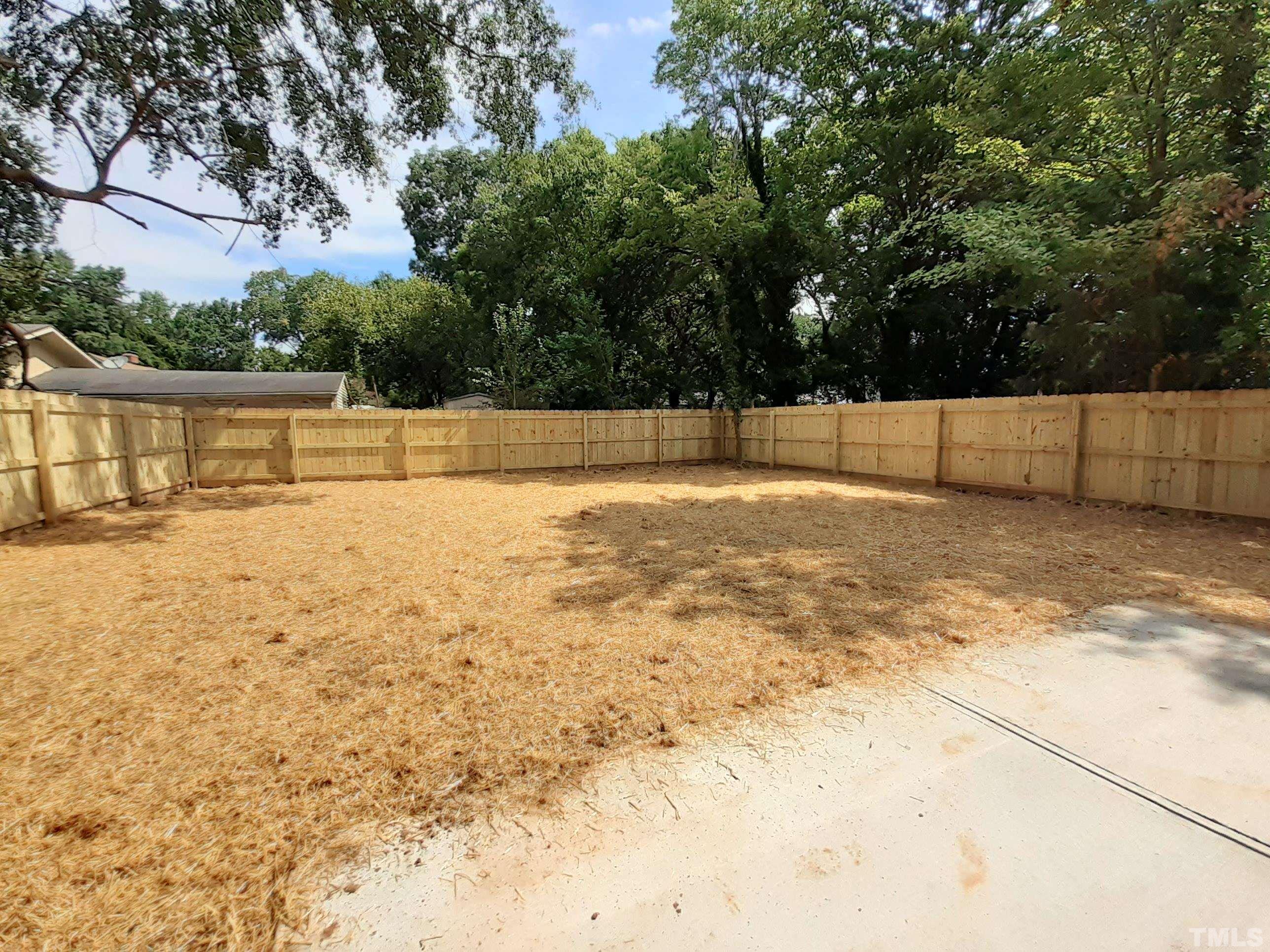 2311 Poole Road Raleigh, NC 27610 - Photo 4 of 29 a view of a backyard