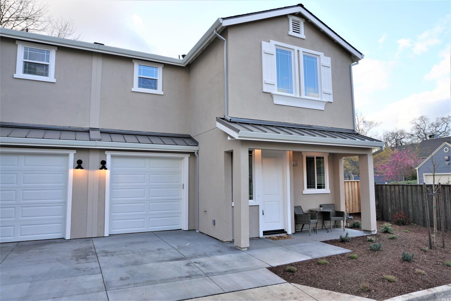 5156 Mattson Place Santa Rosa, CA 95409 - Photo 1 of 1 a front view of a house with garage