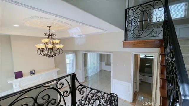 a very nice looking room with a chandelier