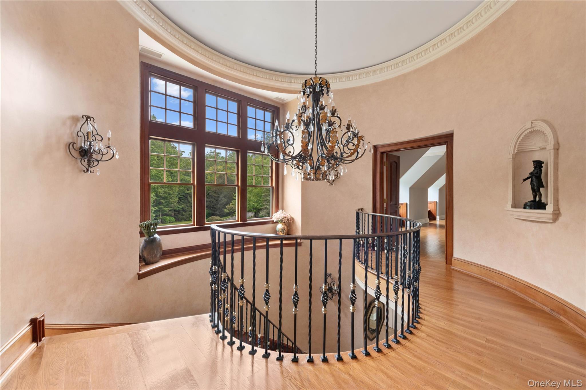 284 West Patent Road Bedford, NY 10549 - Photo 16 of 40 Stairs with wood finished floors, a chandelier, and ornamental molding