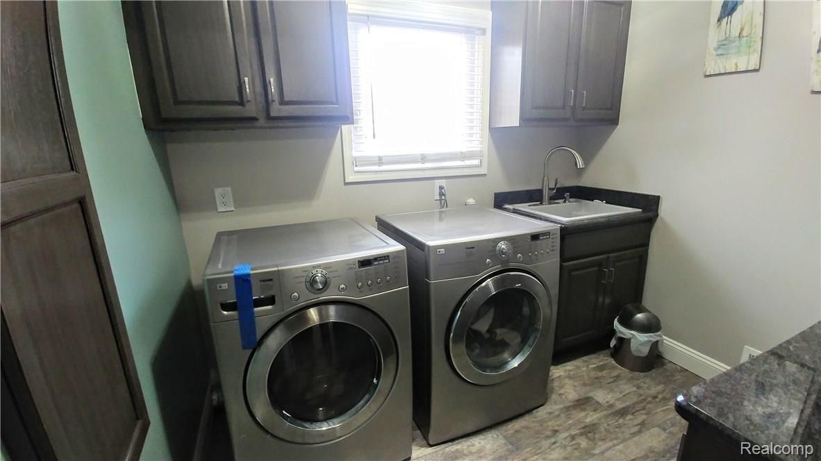 26581 Rinne Road New Boston, MI 48164 - Photo 15 of 35 FIRST FLOOR LAUNDRY - NEWER GRANITE