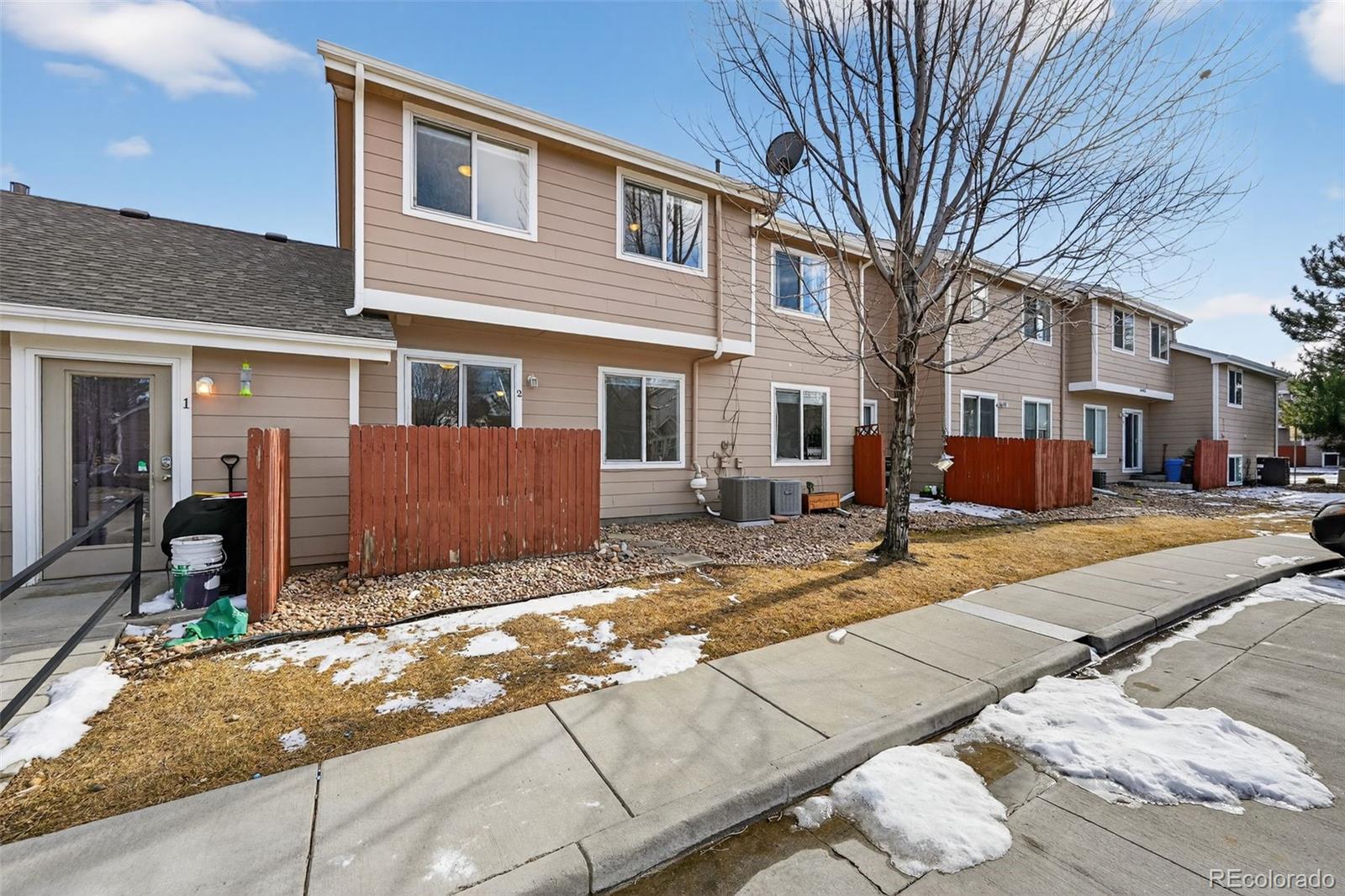 6603 Autumn Ridge Drive, Unit 2 Fort Collins, CO 80525 - Photo 32 of 33 a view of a house with a yard