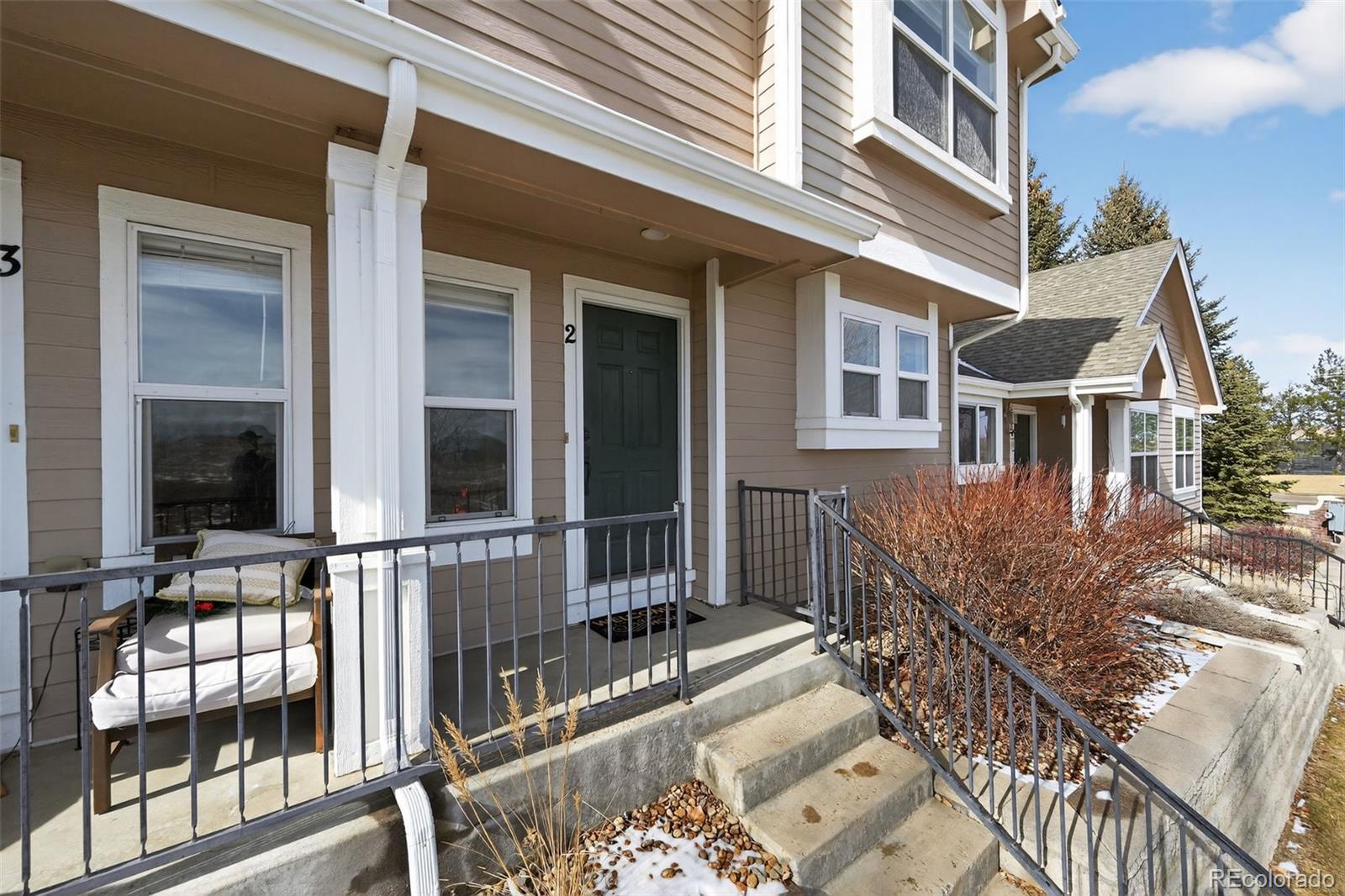 6603 Autumn Ridge Drive, Unit 2 Fort Collins, CO 80525 - Photo 4 of 33 front view of a house with a large windows
