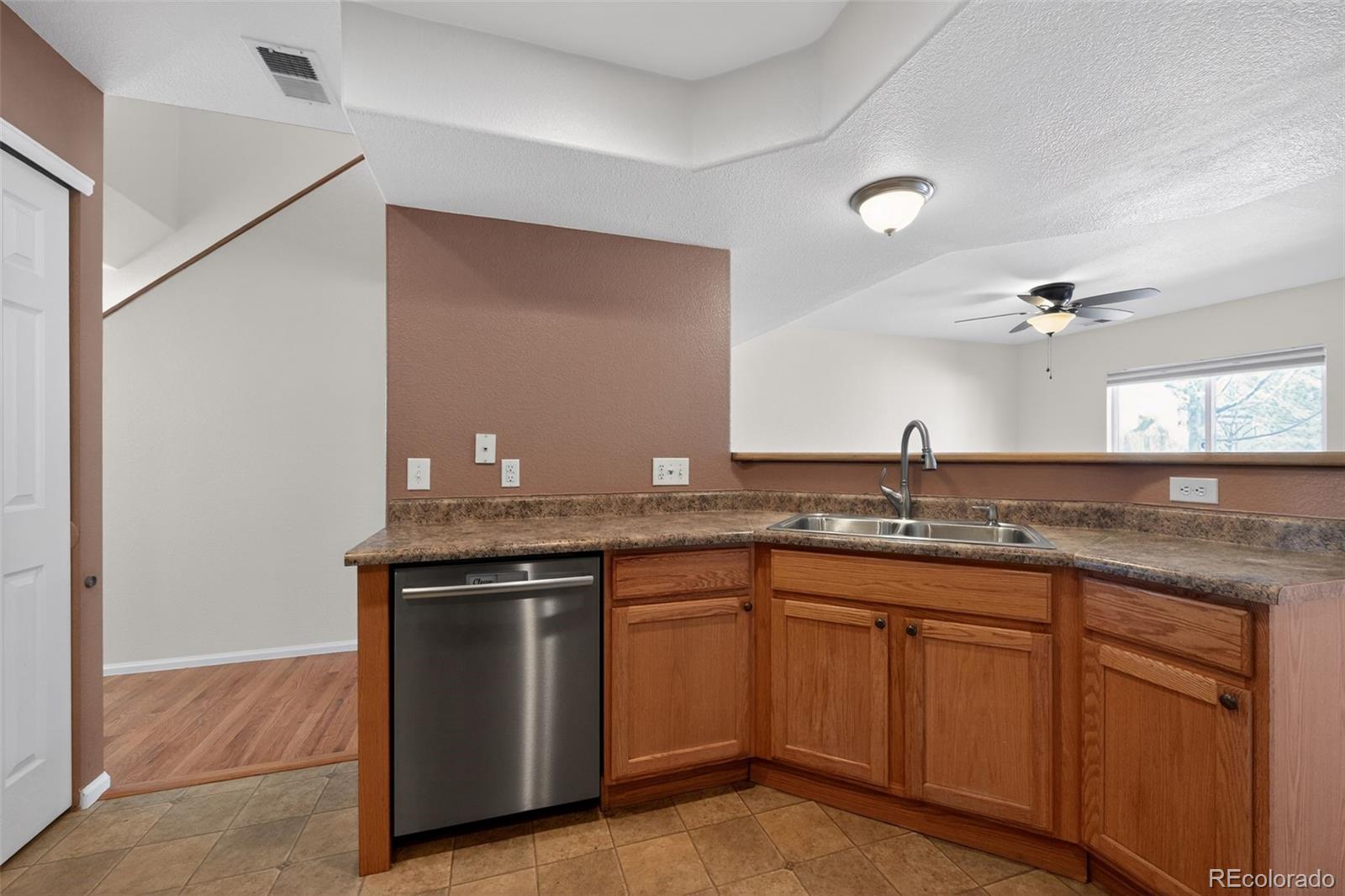 6603 Autumn Ridge Drive, Unit 2 Fort Collins, CO 80525 - Photo 9 of 33 a kitchen with a sink and cabinets