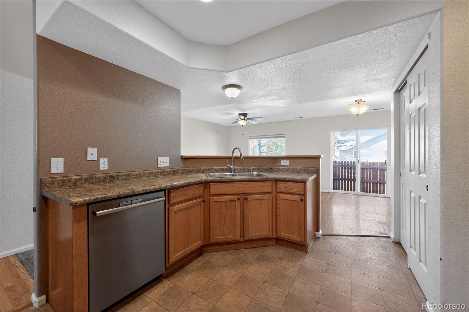6603 Autumn Ridge Drive, Unit 2 Fort Collins, CO 80525 - Photo 10 of 33 a large bathroom with a granite countertop double vanity and a mirror