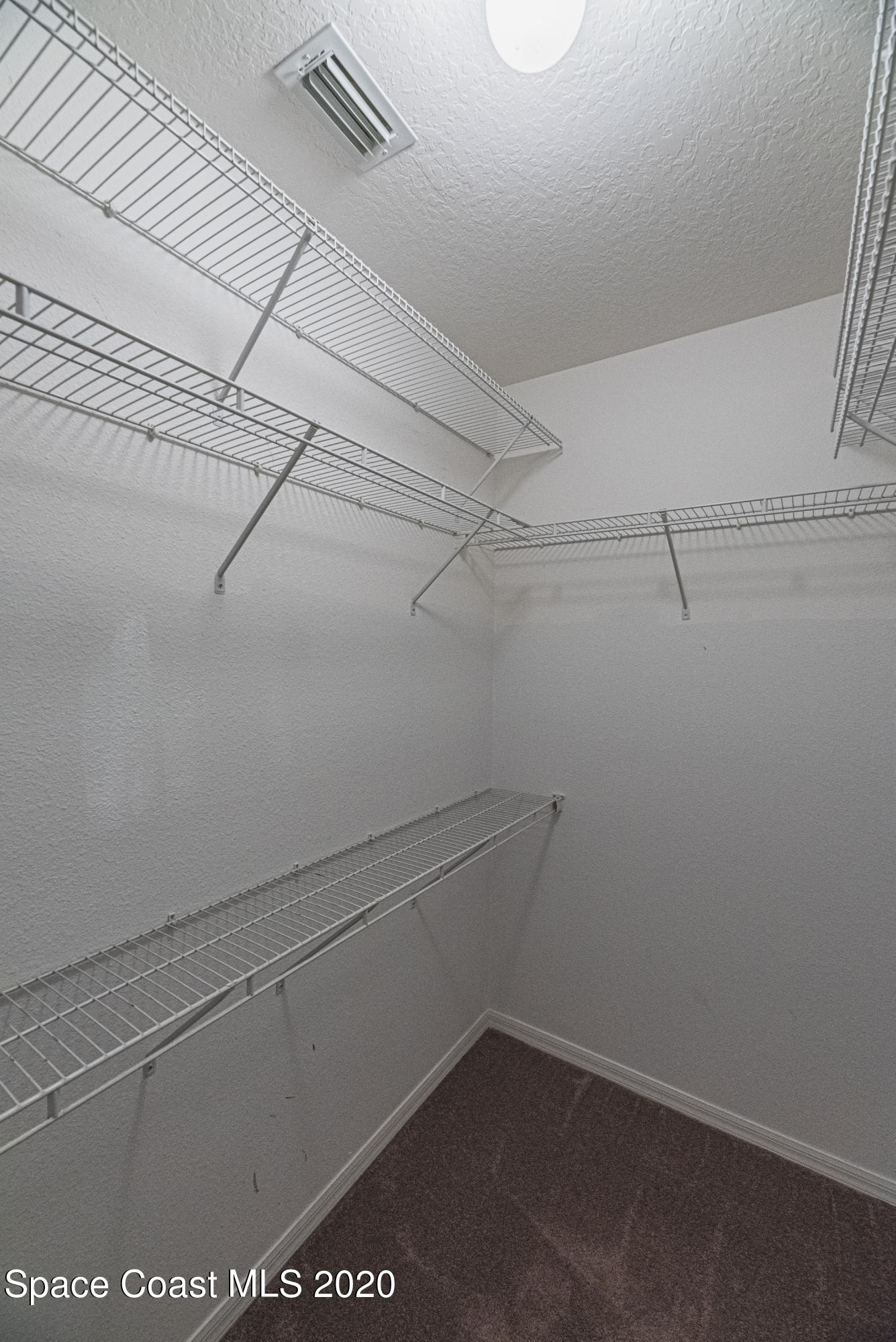 949 Riviera Point Drive Rockledge, FL 32955 - Photo 16 of 29 Master Walk-in