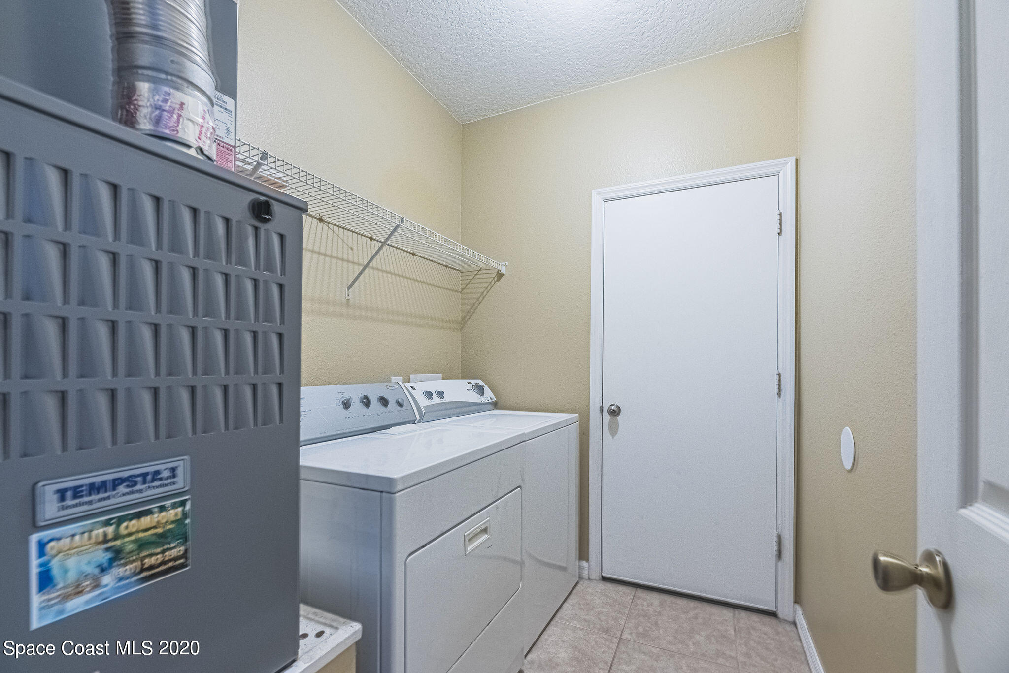 949 Riviera Point Drive Rockledge, FL 32955 - Photo 22 of 29 Laundry Room