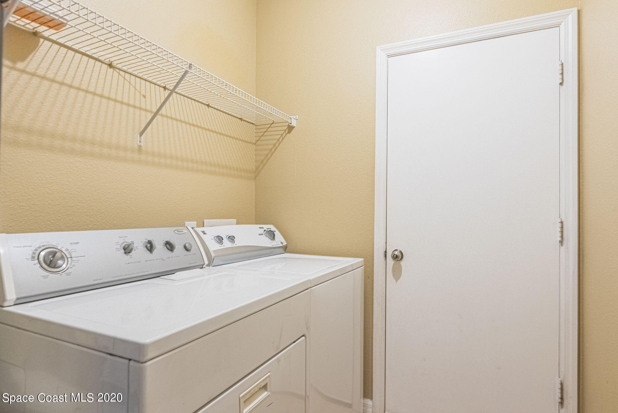 949 Riviera Point Drive Rockledge, FL 32955 - Photo 23 of 29 Laundry Room