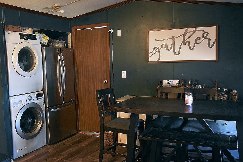 1661 Sassafras Stand Ridge Road Linden, TN 37096 - Photo 9 of 30 a view of a dining room with furniture and wooden floor