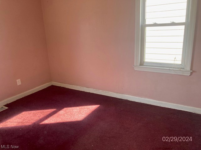 1650 Hillview Road Cleveland, OH 44112 - Photo 6 of 10 Empty room featuring dark carpet