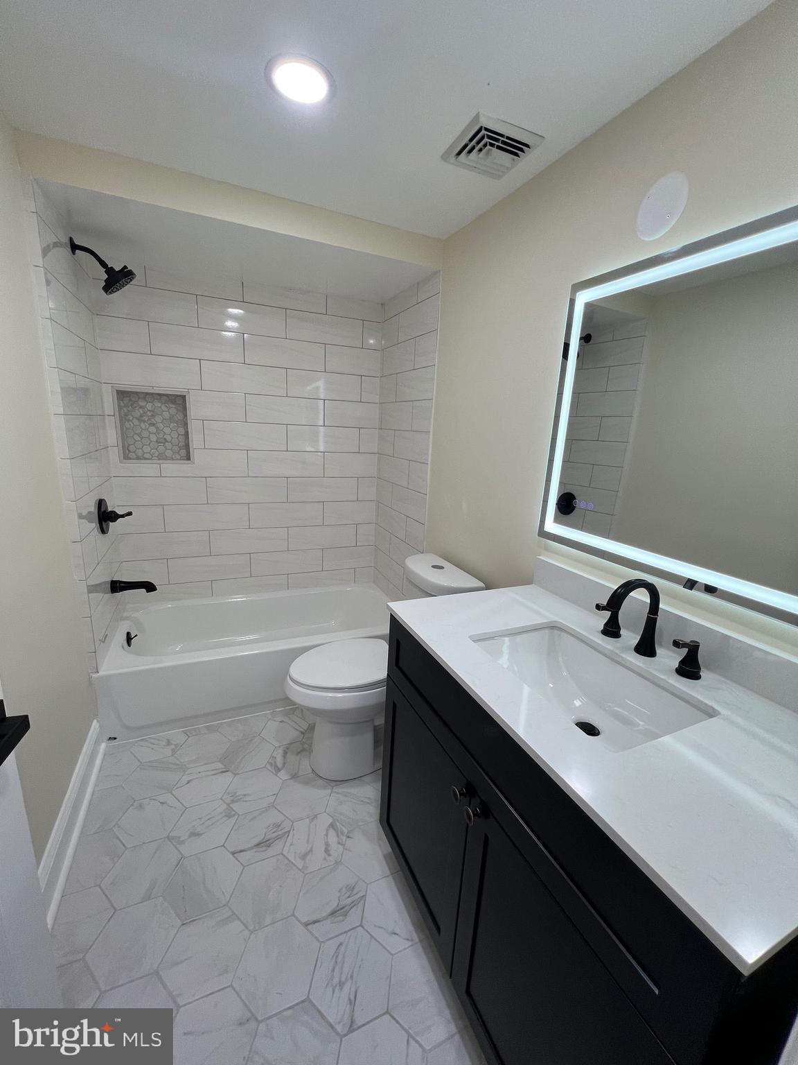 810 Quince Lane Secane, PA 19018 - Photo 27 of 44 a bathroom with a granite countertop sink a toilet and shower