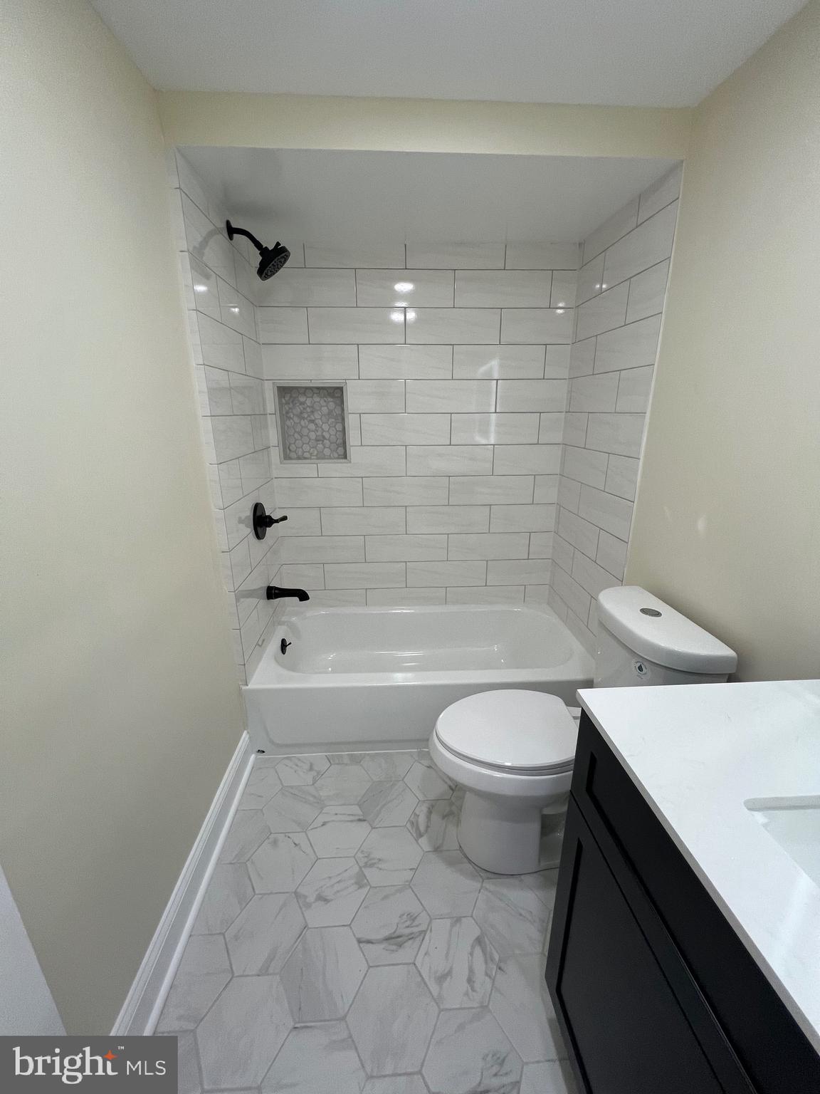 810 Quince Lane Secane, PA 19018 - Photo 30 of 44 a bathroom with a toilet a sink and bathtub