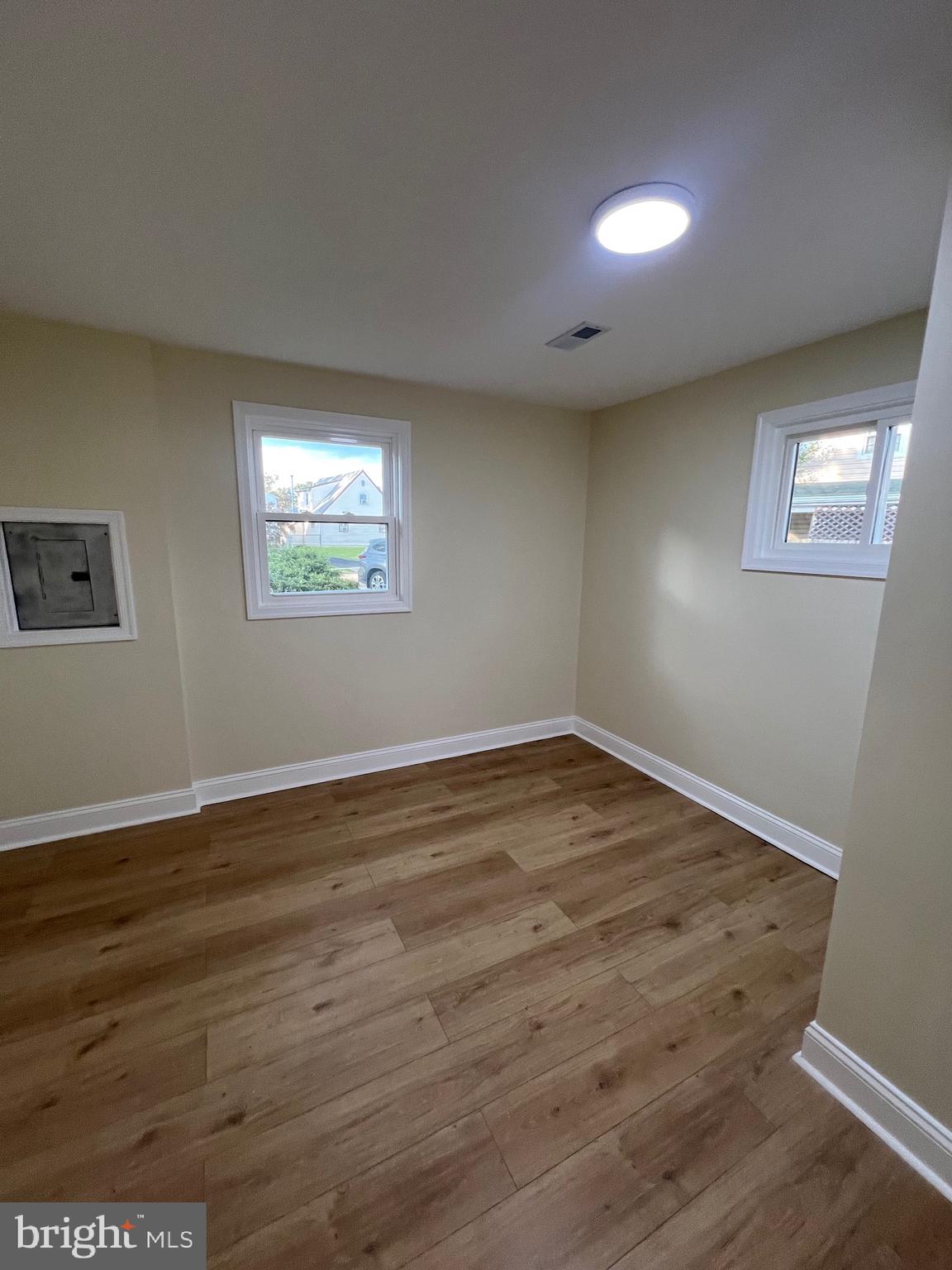 810 Quince Lane Secane, PA 19018 - Photo 34 of 44 a view of empty room with wooden floor
