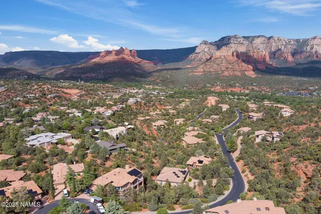 a view of a backyard of a house