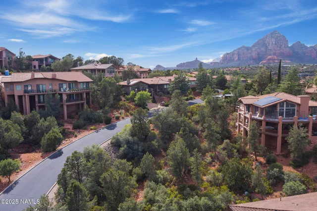 a view of a city with a building in the background
