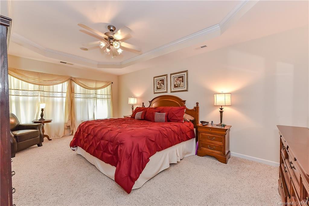 325 Sand Paver Way, Unit 99 Fort Mill, SC 29708 - Photo 18 of 25 a bedroom with a bed and window