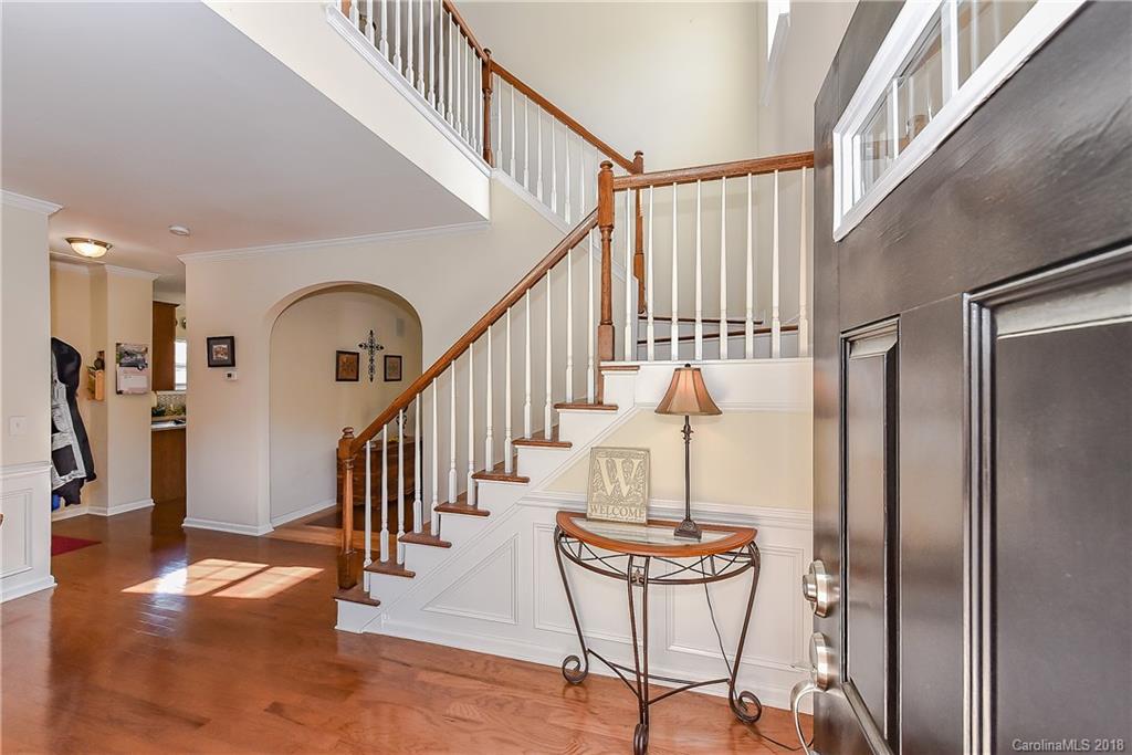 325 Sand Paver Way, Unit 99 Fort Mill, SC 29708 - Photo 3 of 25 a view of entryway and hall with wooden floor
