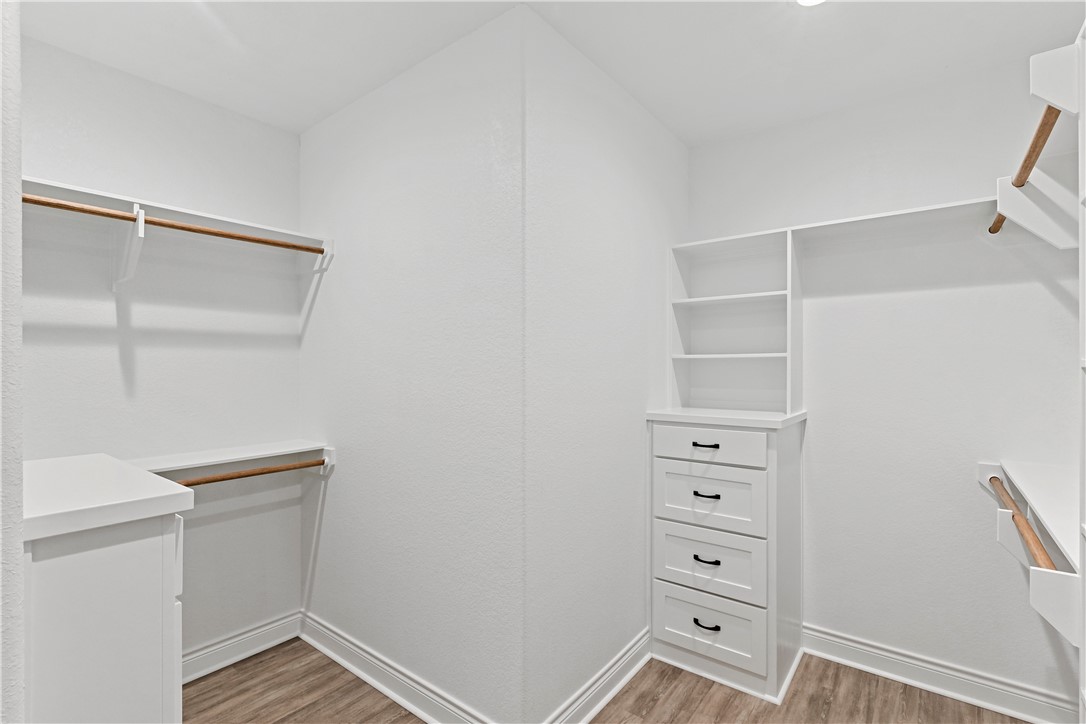 2912 GOLDBERG Drive Bryan, TX 77808 - Photo 31 of 35 a view of an empty walk in closet