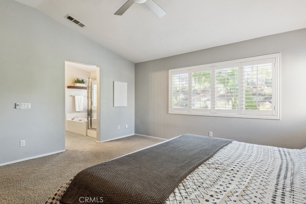 38790 Cobblestone Circle Murrieta, CA 92563 - Photo 22 of 43 a bedroom with a bed and a window