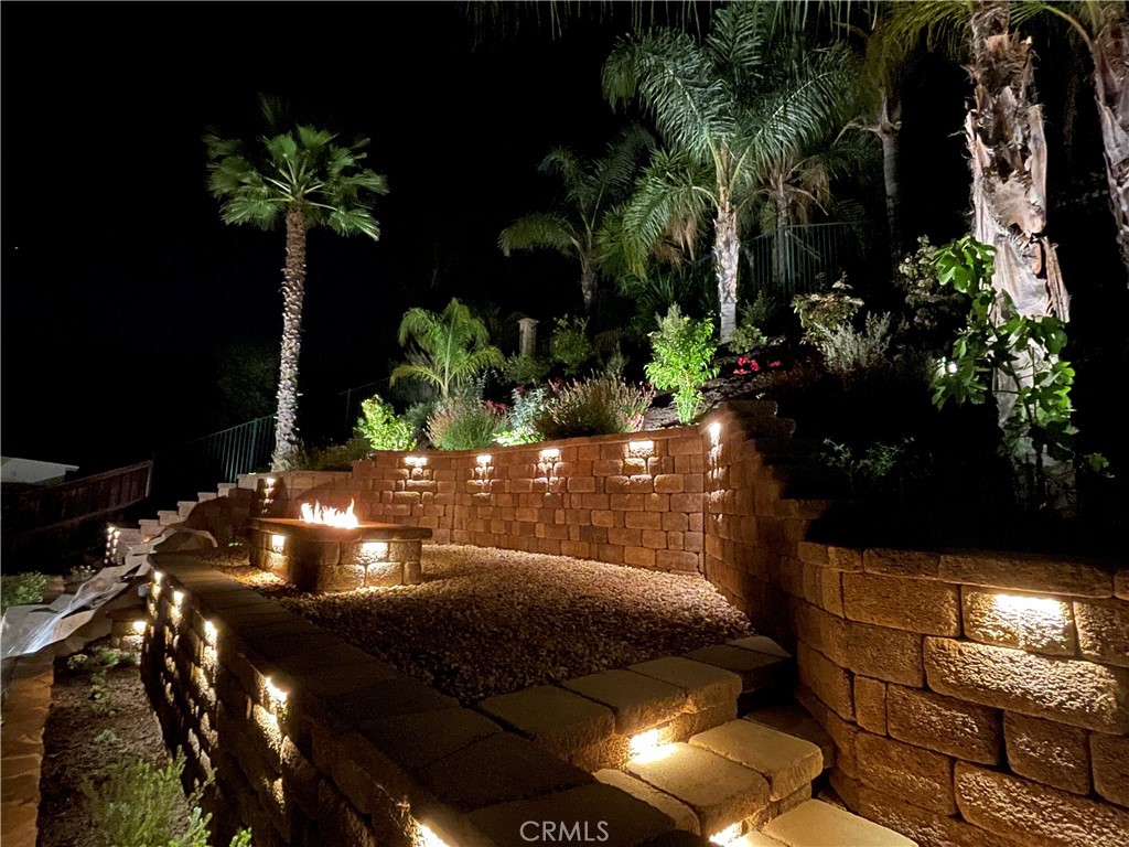 38790 Cobblestone Circle Murrieta, CA 92563 - Photo 3 of 43 a view of a potted flower in a yard