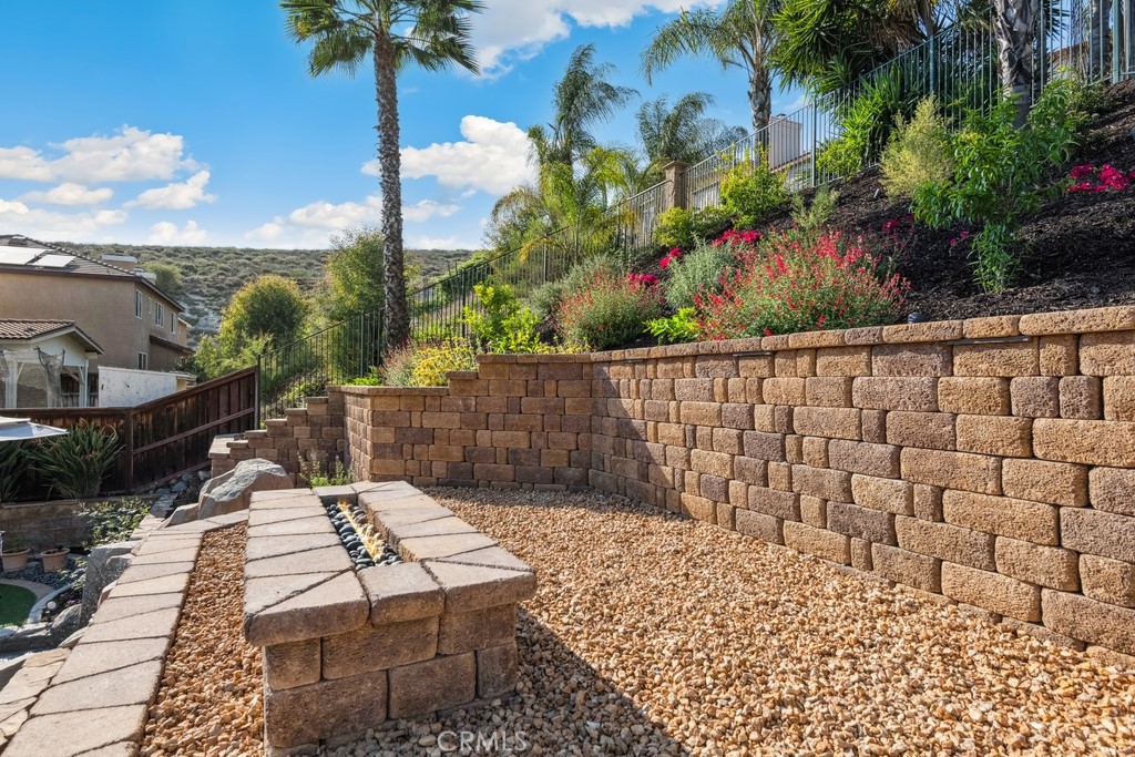 38790 Cobblestone Circle Murrieta, CA 92563 - Photo 42 of 43 a view of a chairs and table in the patio