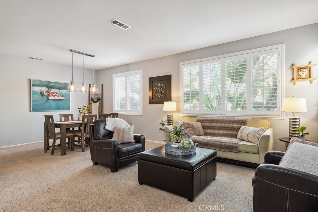 38790 Cobblestone Circle Murrieta, CA 92563 - Photo 7 of 43 a living room with furniture and a large window