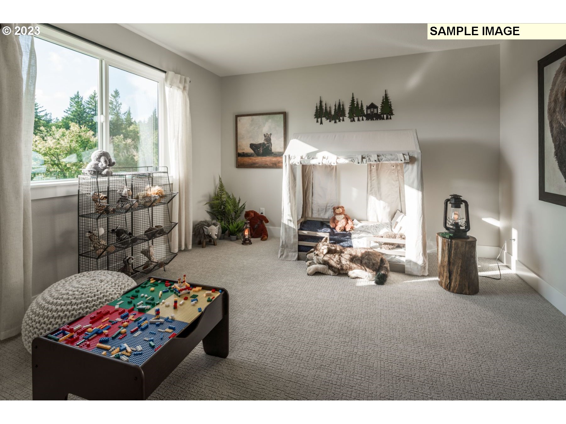 1121 South 46th Place Ridgefield, WA 98642 - Photo 16 of 18 a living room with furniture and a large window