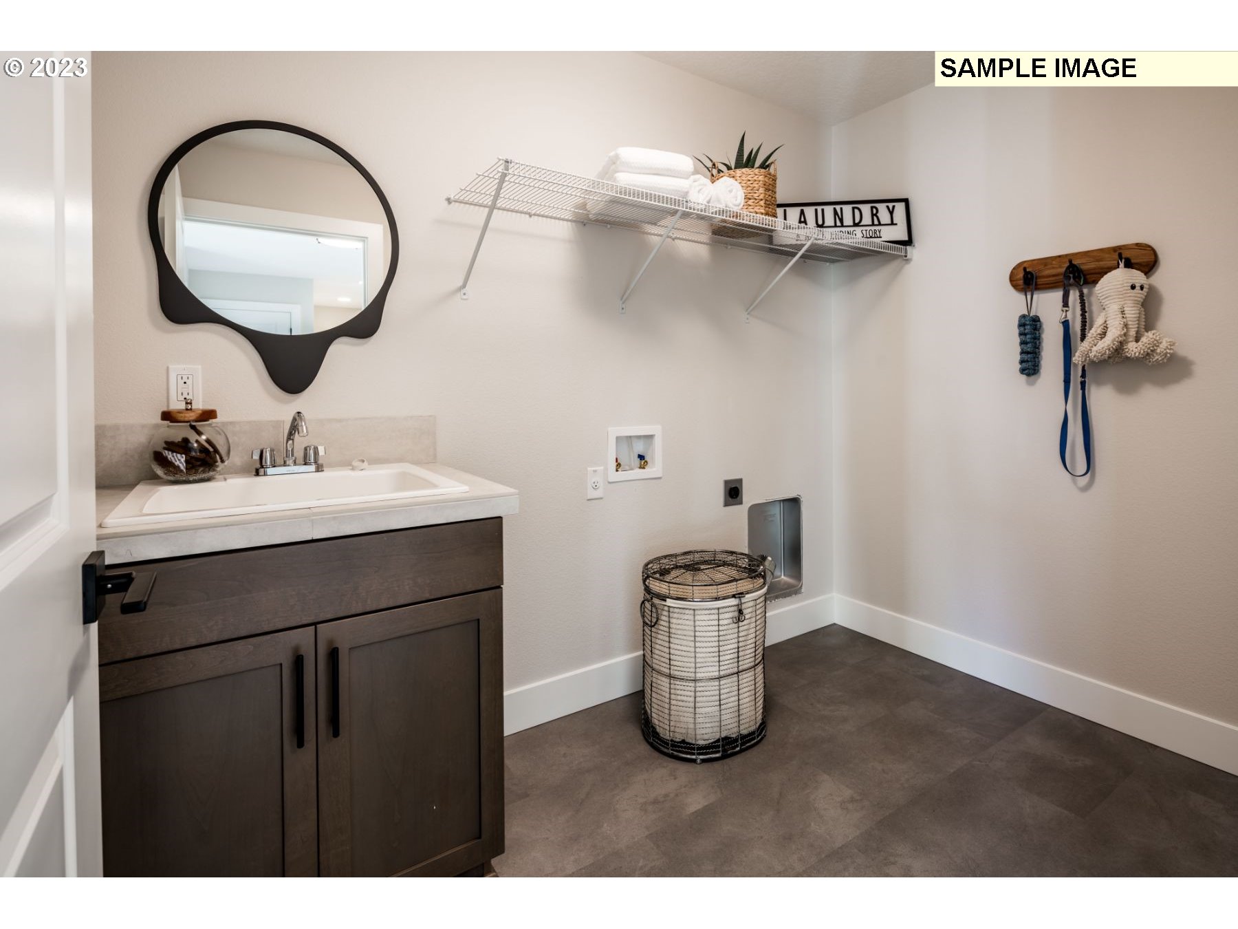 1121 South 46th Place Ridgefield, WA 98642 - Photo 17 of 18 a bathroom with a sink and a mirror