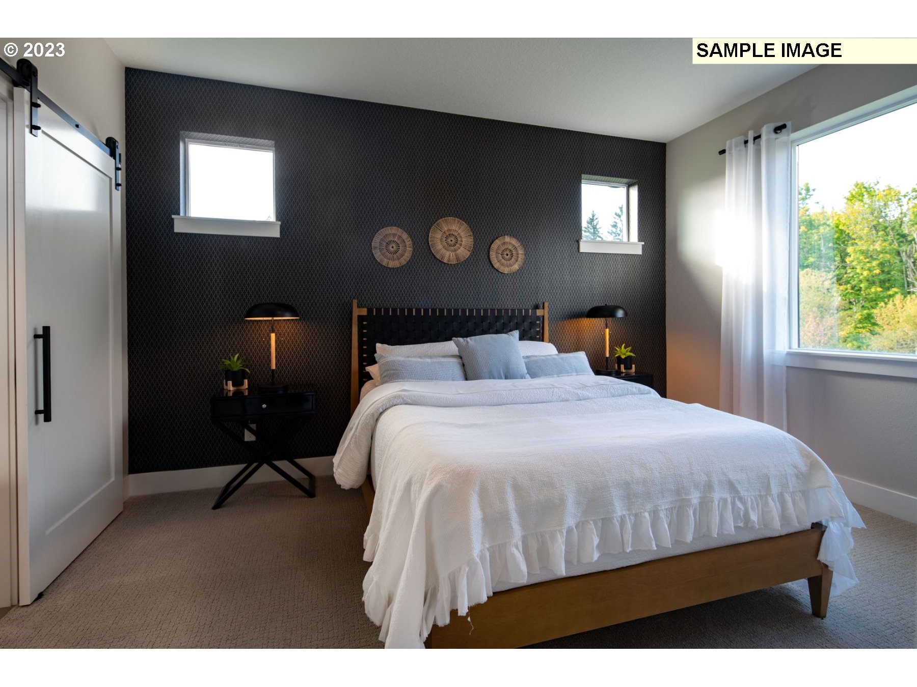 1121 South 46th Place Ridgefield, WA 98642 - Photo 10 of 18 a bedroom with a bed and window