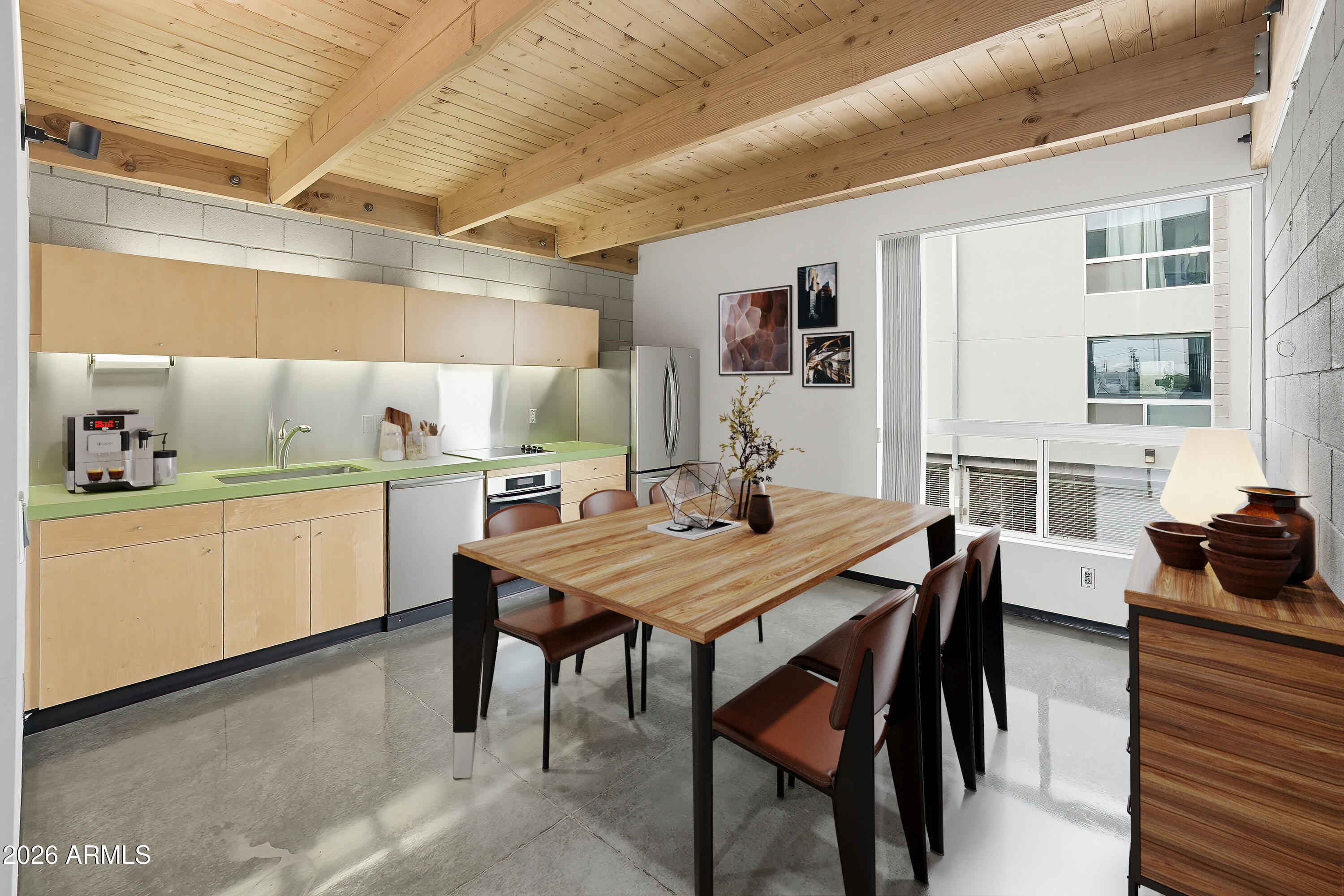 727 East Portland Street, Unit 35 Phoenix, AZ 85006 - Photo 11 of 49 a kitchen with a table chairs and a stove