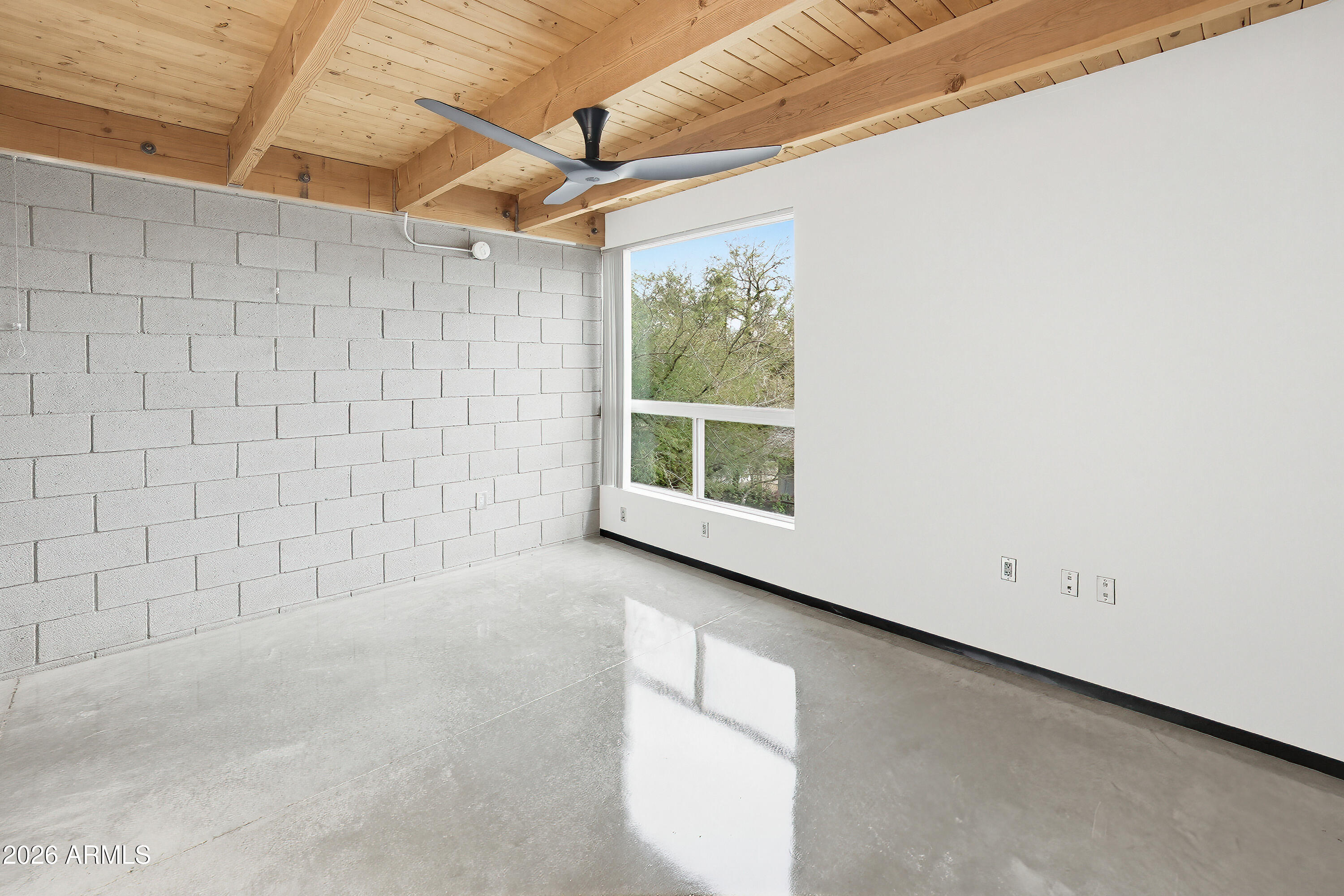 727 East Portland Street, Unit 35 Phoenix, AZ 85006 - Photo 16 of 49 a view of an empty room with a window