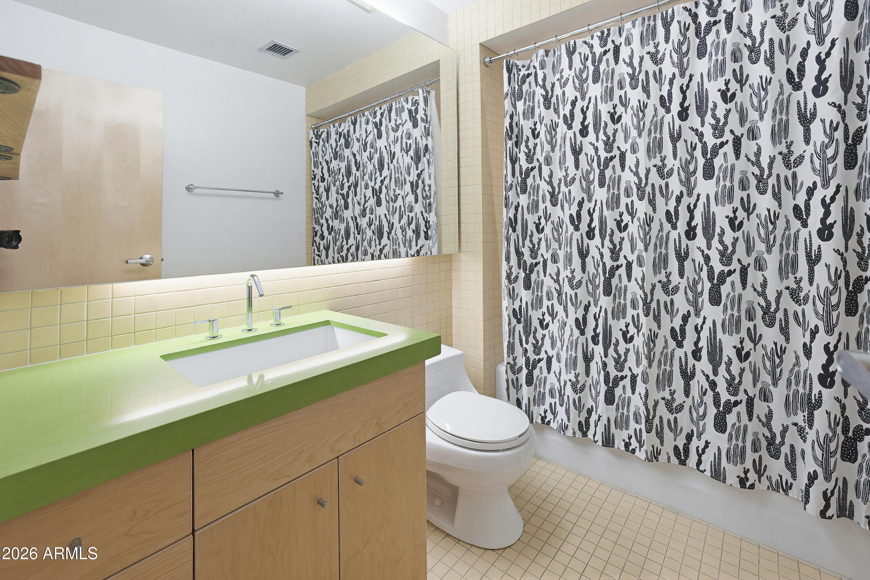 727 East Portland Street, Unit 35 Phoenix, AZ 85006 - Photo 19 of 49 a bathroom with a sink toilet and shower