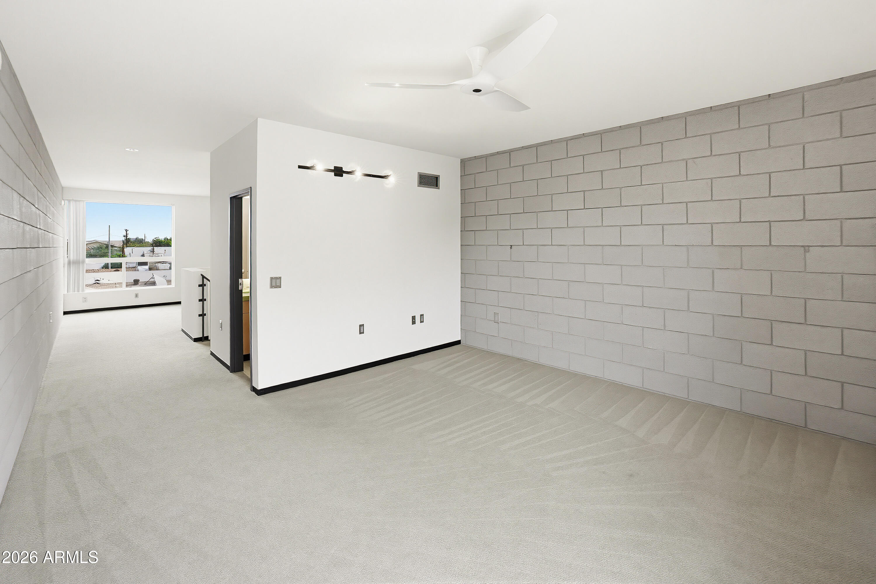 727 East Portland Street, Unit 35 Phoenix, AZ 85006 - Photo 27 of 49 a view of a room with white walls