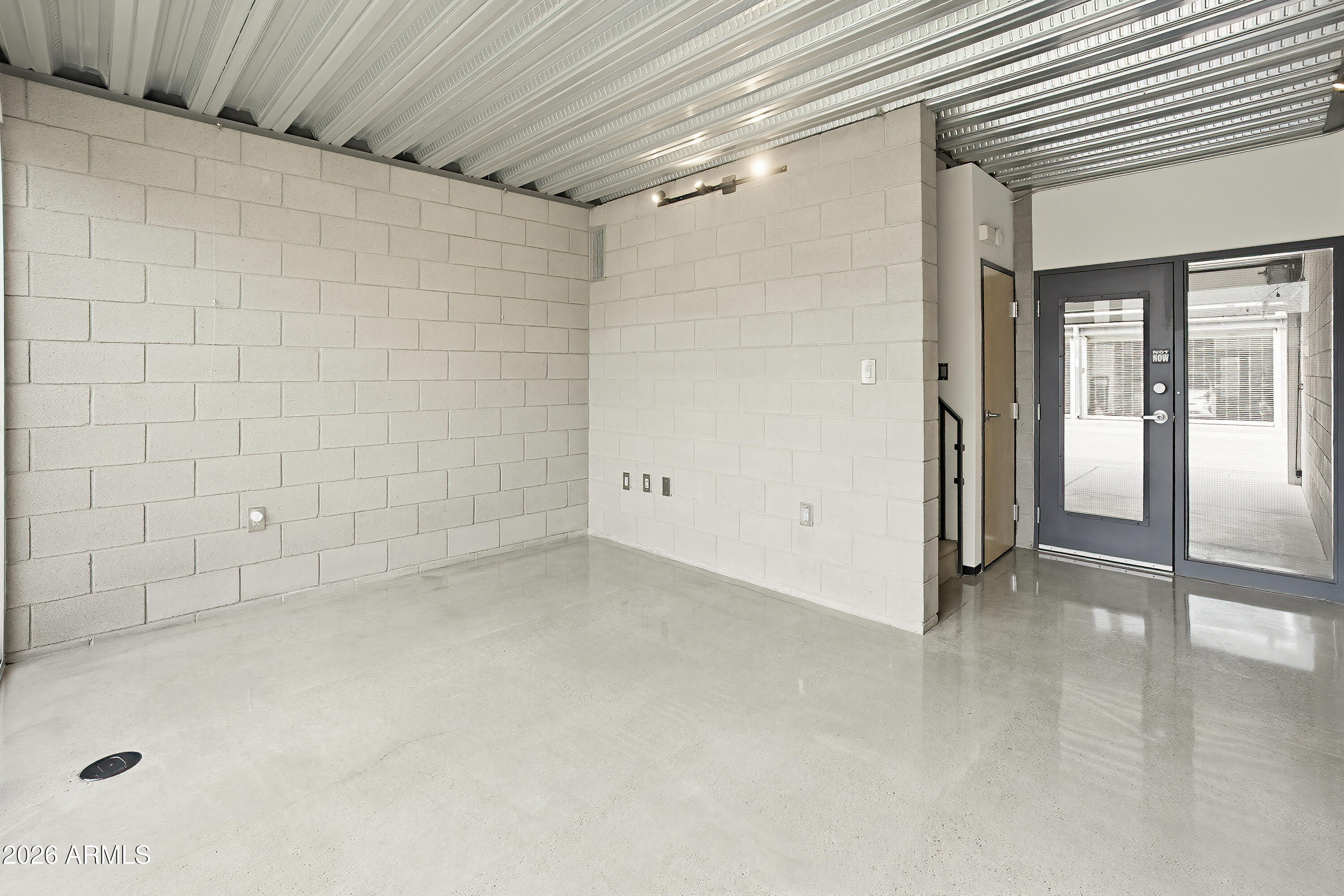 727 East Portland Street, Unit 35 Phoenix, AZ 85006 - Photo 7 of 49 a view of a room with white walls