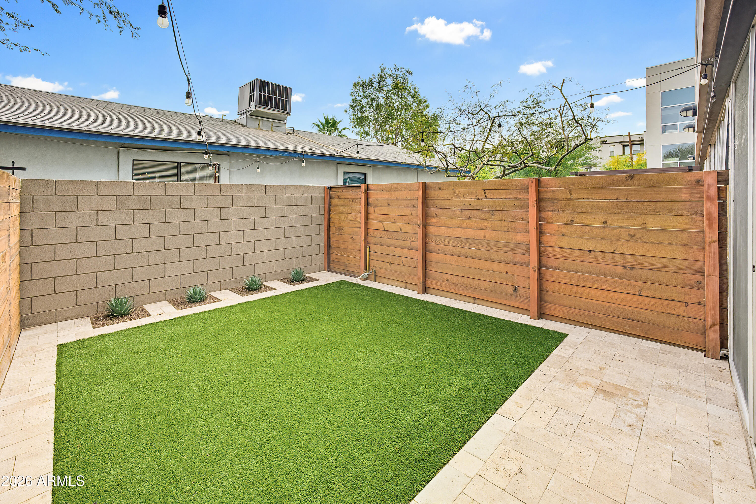 727 East Portland Street, Unit 35 Phoenix, AZ 85006 - Photo 8 of 49 a view of a backyard with plants