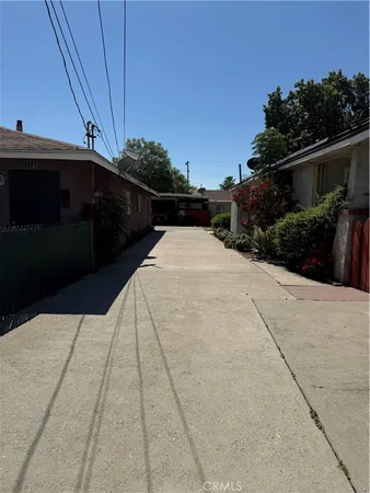 a view of balcony and car parked