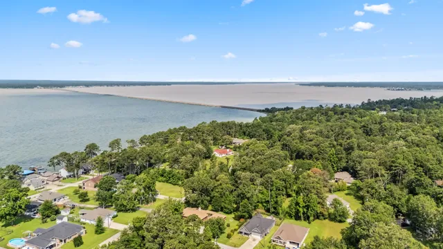 a view of a lake with a city