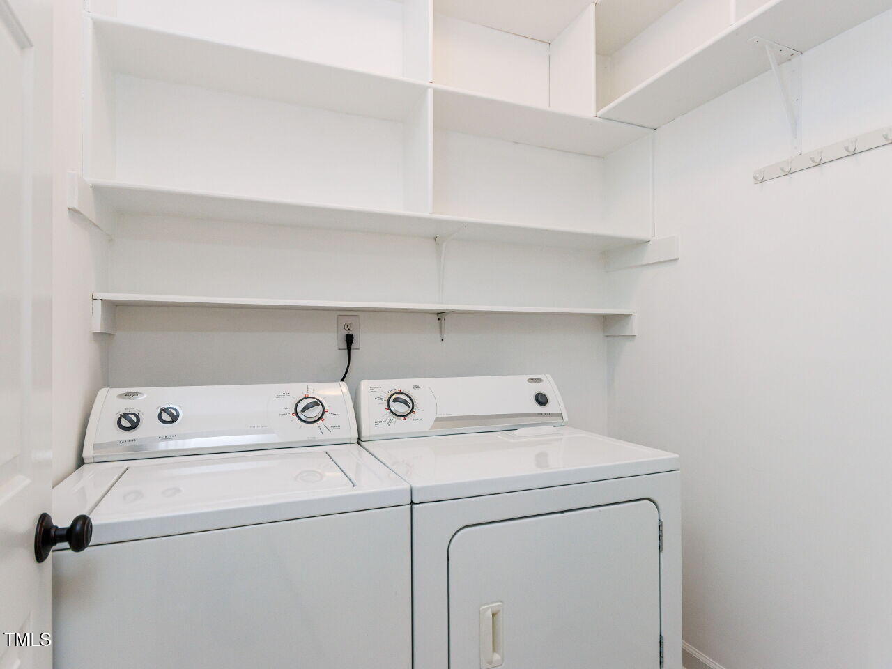 4613 Wee Burn Trail Raleigh, NC 27612 - Photo 28 of 49 Main floor laundry room with built-in shelving