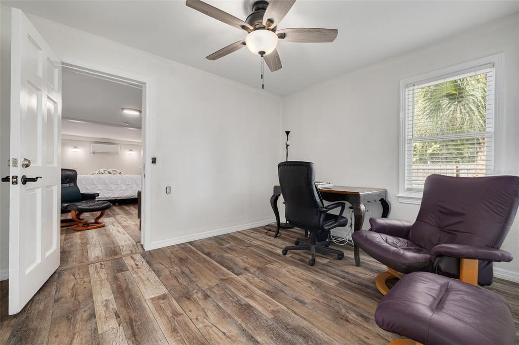 200 Broadway Dunedin, FL 34698 - Photo 15 of 59 a view of a livingroom with a workspace