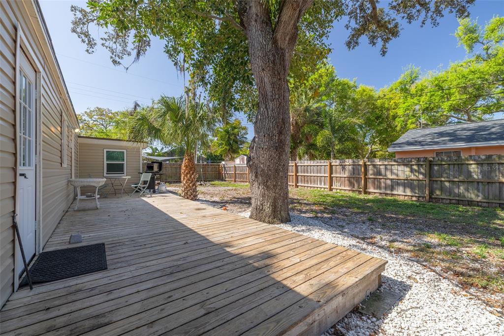 200 Broadway Dunedin, FL 34698 - Photo 25 of 59 a view of a backyard with a patio