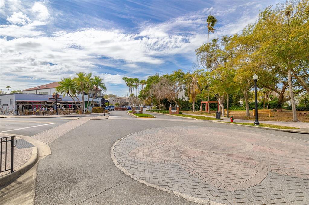 200 Broadway Dunedin, FL 34698 - Photo 36 of 59 a view of building with cars parked on the roadside