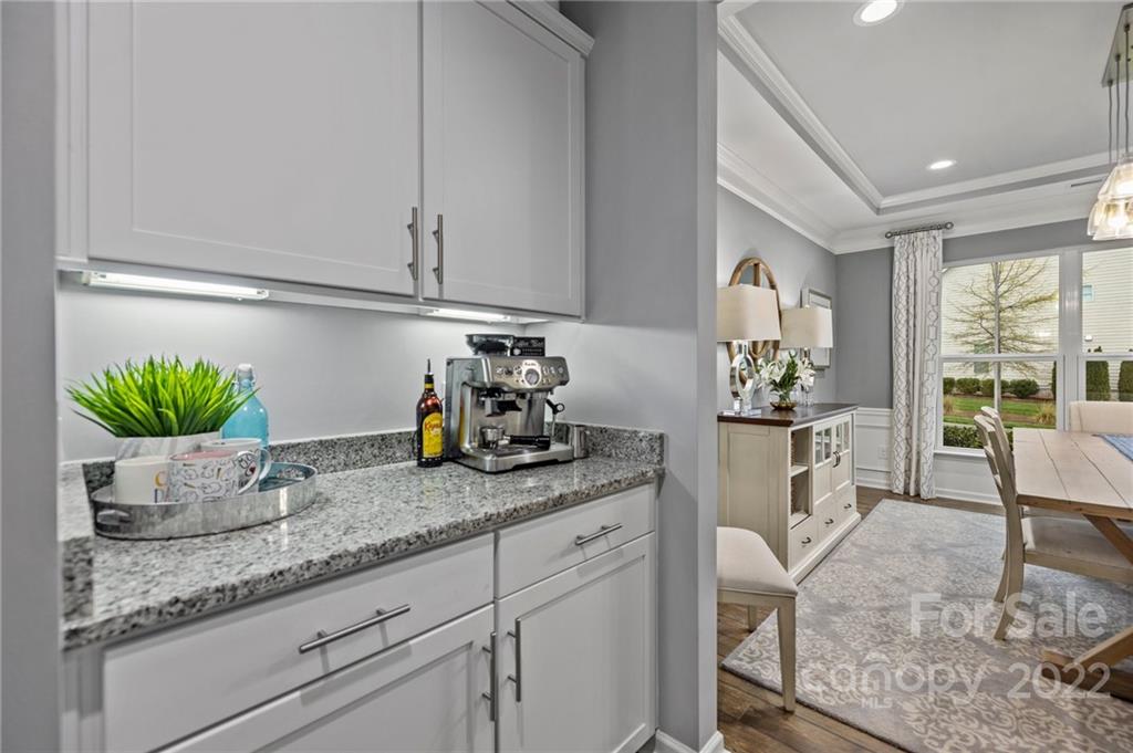 270 Hampton Trail Drive Fort Mill, SC 29708 - Photo 22 of 42 a kitchen with stainless steel appliances granite countertop a sink a stove and cabinets