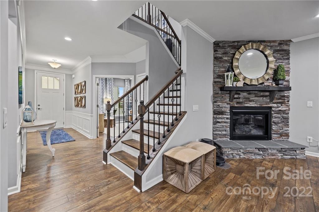 270 Hampton Trail Drive Fort Mill, SC 29708 - Photo 24 of 42 a living room with fireplace furniture and a wooden floor